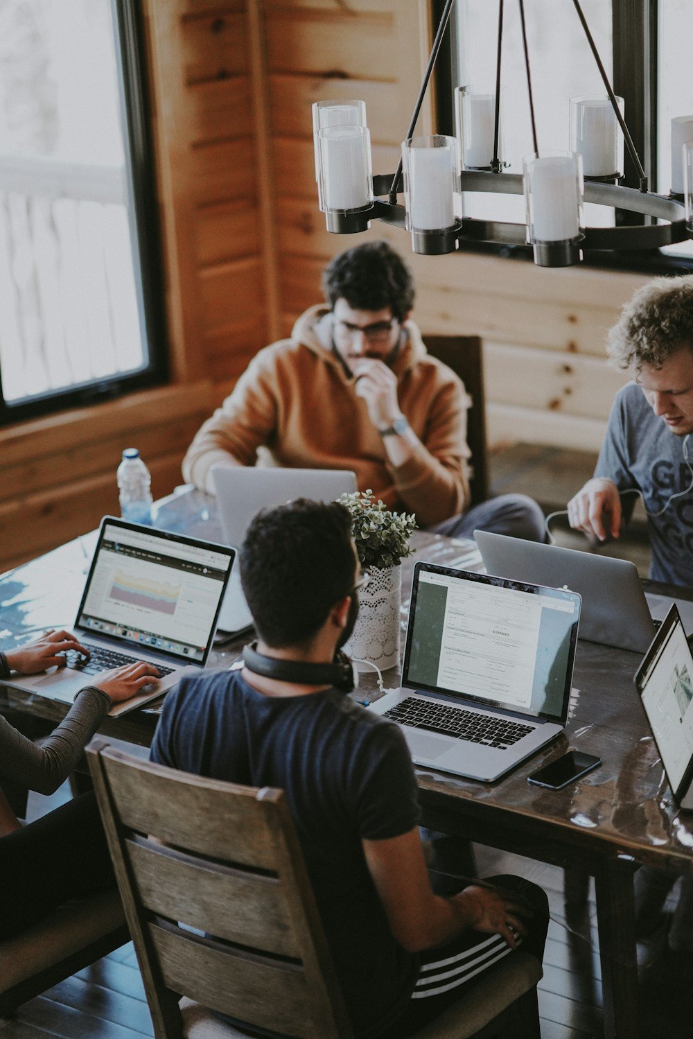 Founders and engineers working side by side around one table
