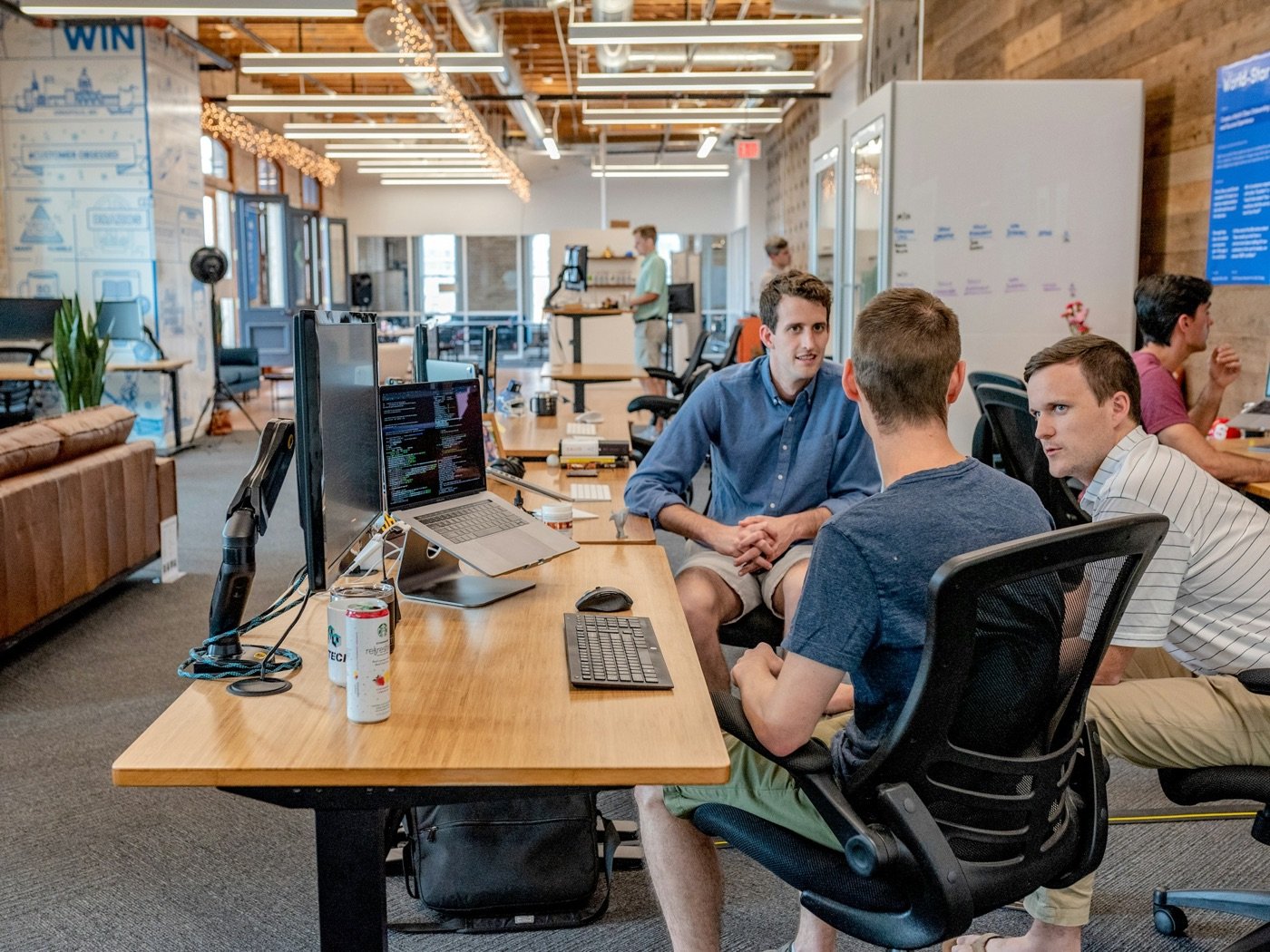 A team working together in a bright open office